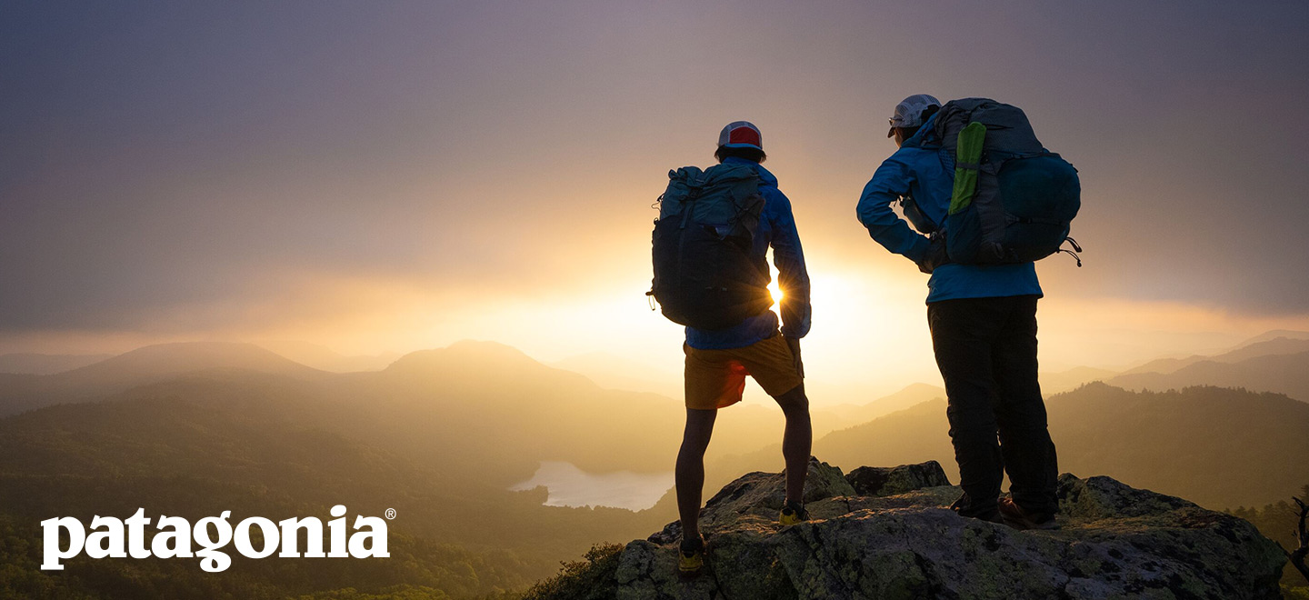 two hikers with the patagonia logo on the bottom left